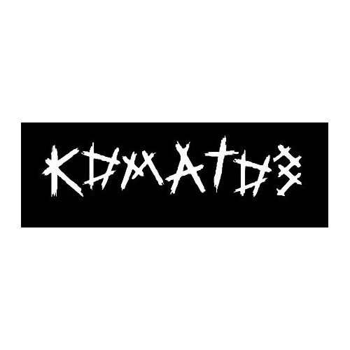 Komatoz - logo